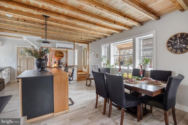 dining area featuring wood ceiling, a wall mounted AC, beamed ceiling, and light hardwood / wood-style floors