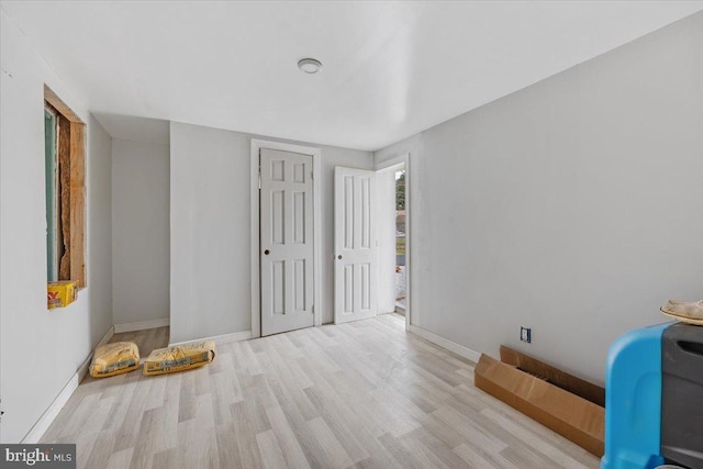 interior space with light hardwood / wood-style flooring