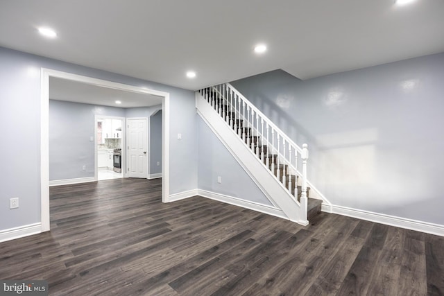 stairs with hardwood / wood-style floors