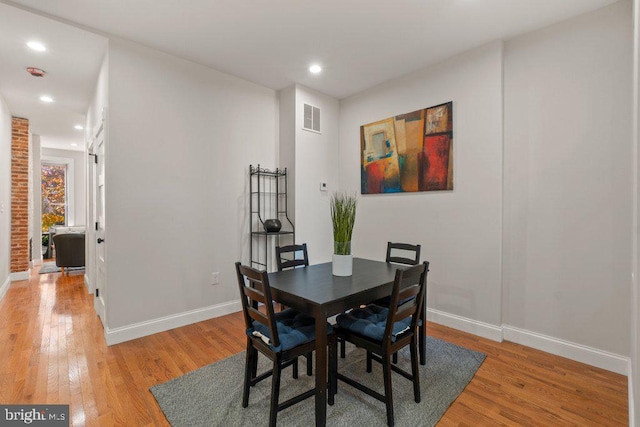 dining room featuring light hardwood / wood-style floors