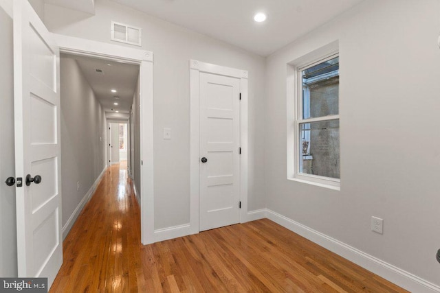 hallway featuring hardwood / wood-style floors