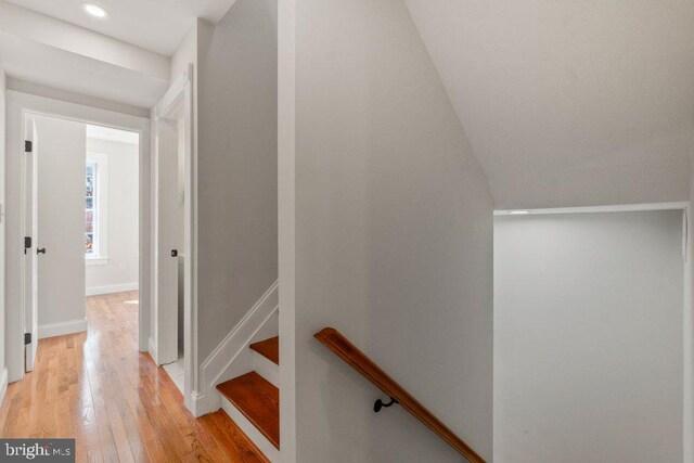 hall with light hardwood / wood-style floors