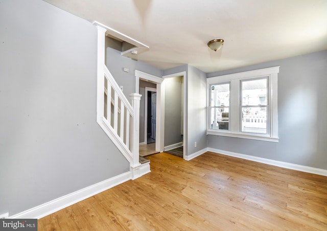 unfurnished room featuring light hardwood / wood-style flooring