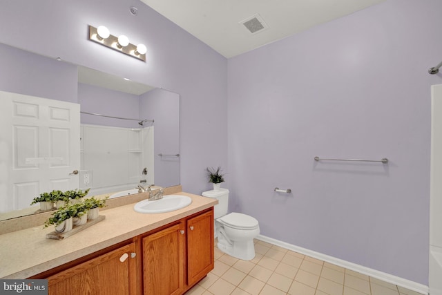 full bathroom featuring bathtub / shower combination, vanity, tile patterned flooring, and toilet