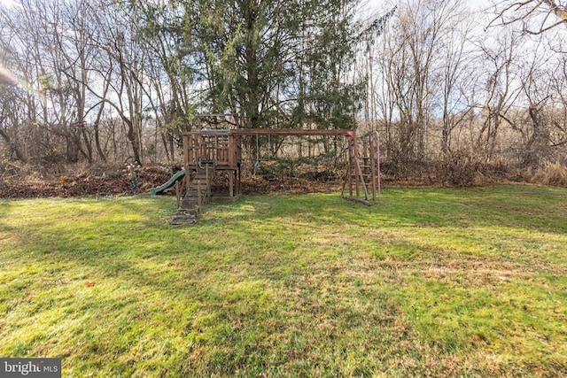 view of yard featuring a playground