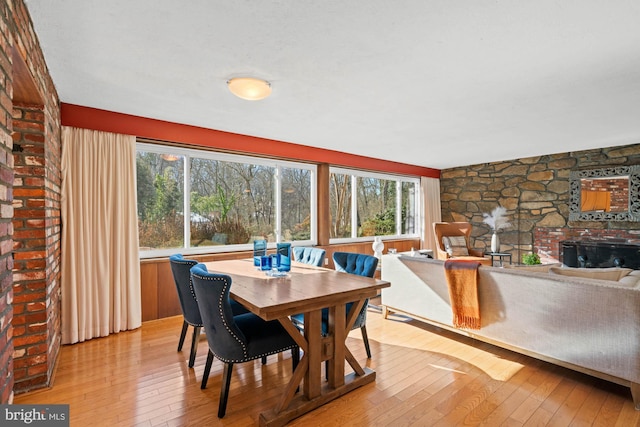 dining space featuring light wood-type flooring