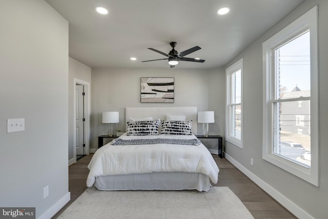 bedroom featuring ceiling fan and hardwood / wood-style floors