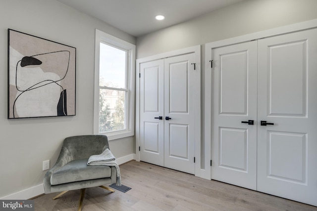 living area featuring light wood-type flooring