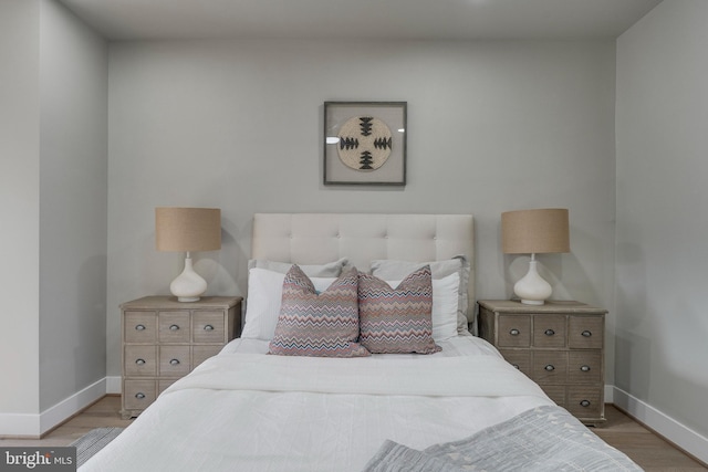 bedroom featuring light wood-type flooring