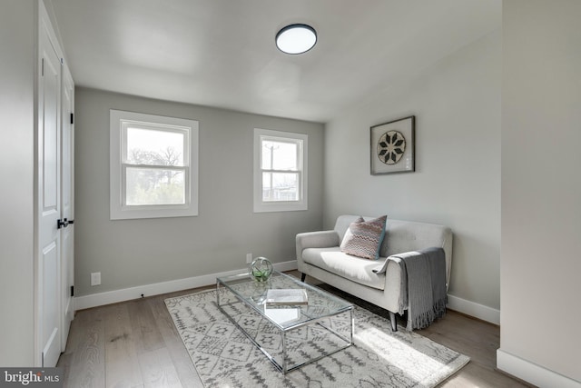 sitting room featuring light hardwood / wood-style floors