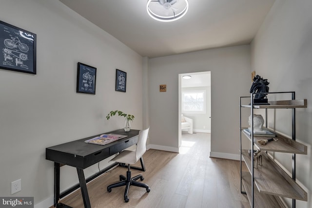 home office featuring light wood-type flooring