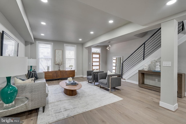 living room with light hardwood / wood-style floors