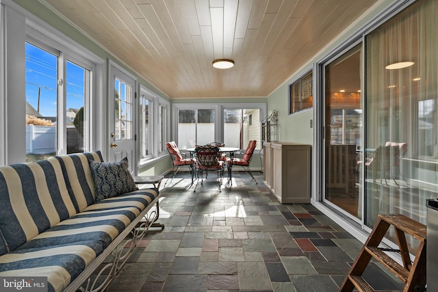 sunroom with wood ceiling