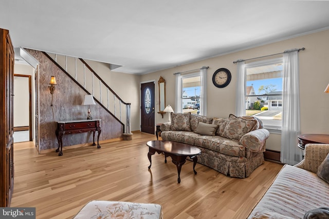 living room with light hardwood / wood-style flooring