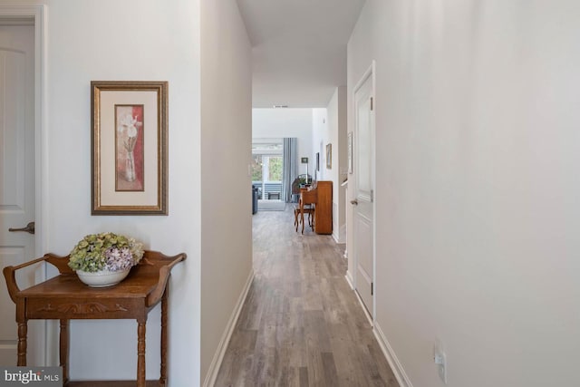 hall featuring light wood-type flooring