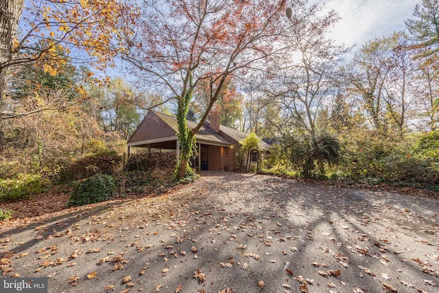 view of front of property with a carport