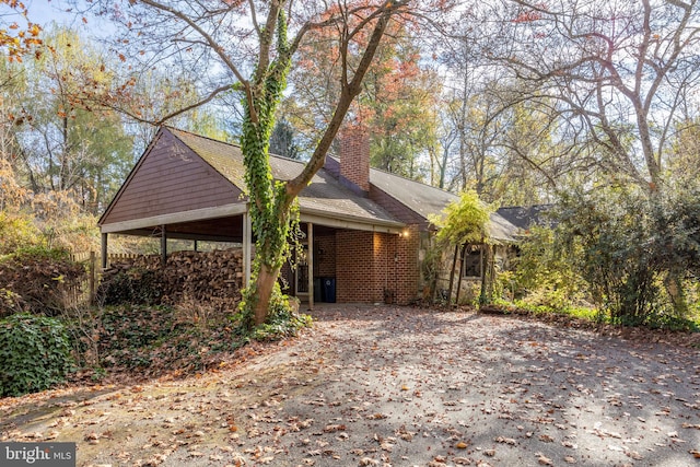 view of front of house with a carport