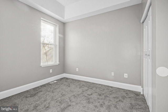 unfurnished bedroom with carpet flooring