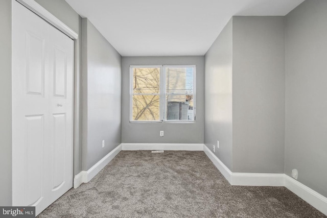 1806 E Lafayette Ave, Baltimore, MD 21213 - unfurnished bedroom featuring carpet and baseboards