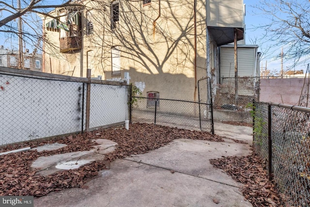 1806 E Lafayette Ave, Baltimore, MD 21213 - view of side of home featuring stucco siding