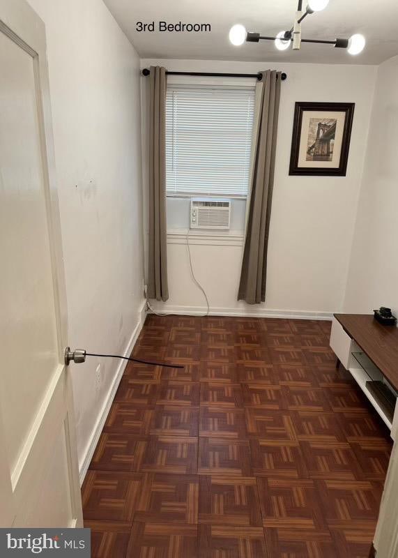 corridor with cooling unit and dark parquet flooring