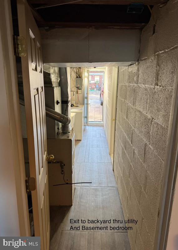 corridor featuring washer / clothes dryer