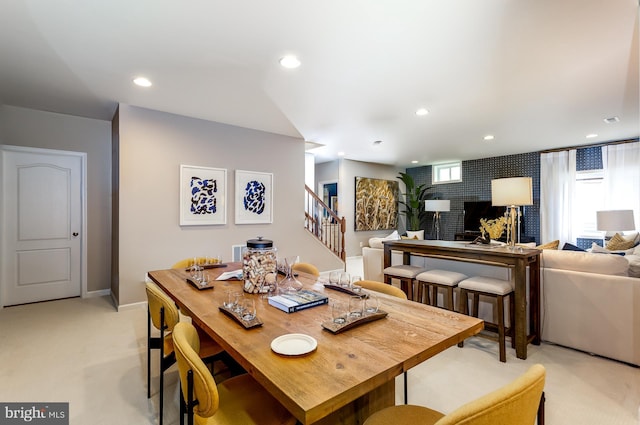 dining area with light carpet