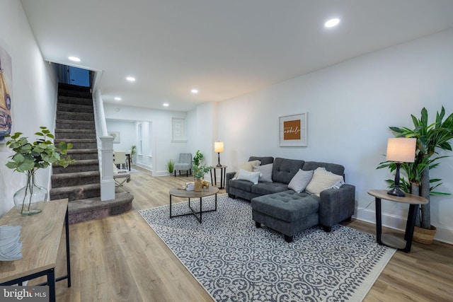 living room with light hardwood / wood-style floors