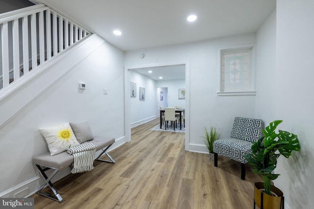 sitting room featuring wood-type flooring