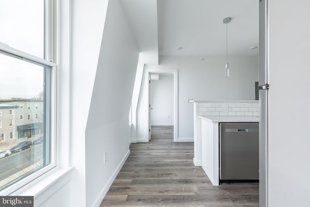 corridor featuring wood-type flooring