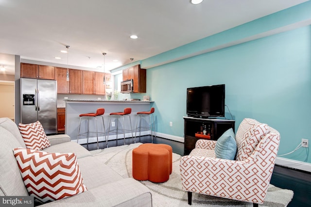 living room with wood-type flooring