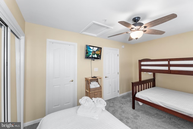 carpeted bedroom with ceiling fan