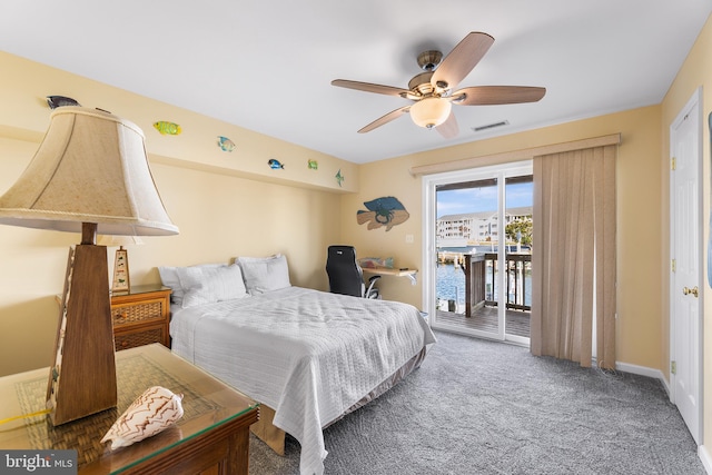 carpeted bedroom featuring access to outside and ceiling fan