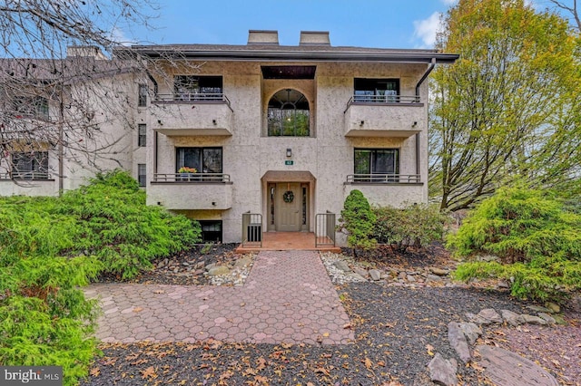 view of front of home with central air condition unit