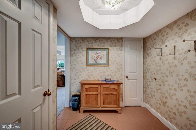 bathroom with tile patterned floors