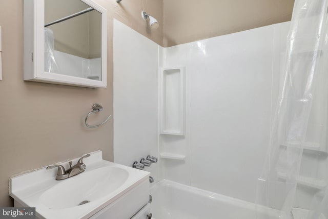 bathroom with vanity and shower / tub combo with curtain