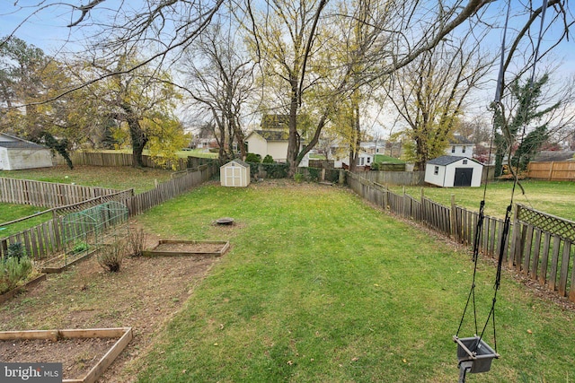 view of yard with a storage shed