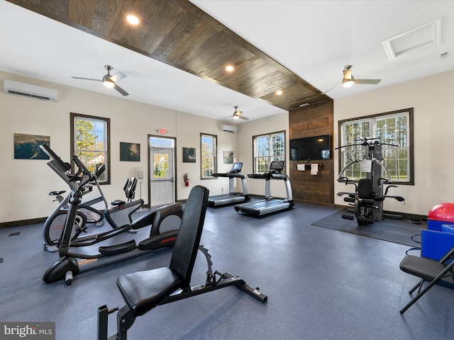 exercise room featuring an AC wall unit, ceiling fan, and wood ceiling