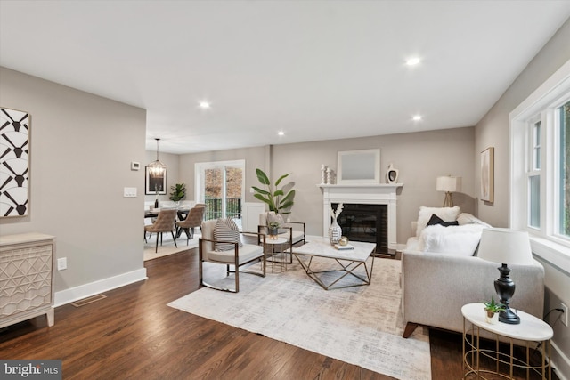 living room featuring dark hardwood / wood-style floors