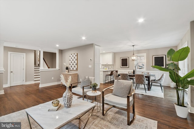 living room featuring dark hardwood / wood-style flooring