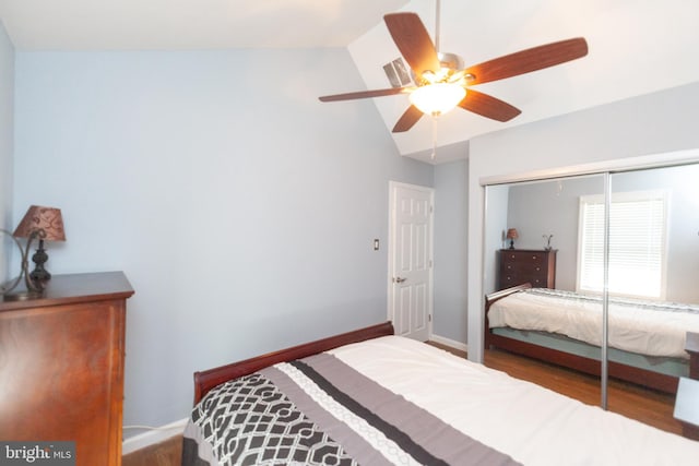 4504 Harbor Beach Blvd, Brigantine, NJ 08203 - bedroom featuring lofted ceiling, a closet, wood finished floors, baseboards, and a ceiling fan