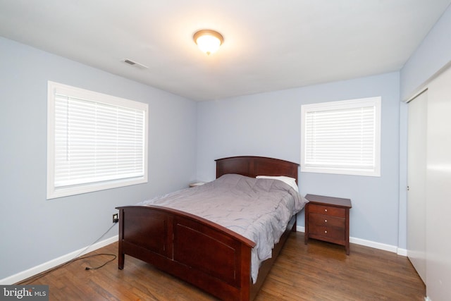 4504 Harbor Beach Blvd, Brigantine, NJ 08203 - bedroom with wood finished floors, baseboards, and a closet