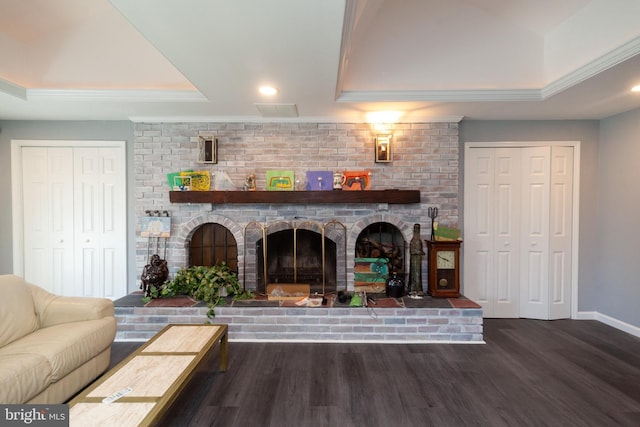 4504 Harbor Beach Blvd, Brigantine, NJ 08203 - living room with a tray ceiling, wood finished floors, ornamental molding, baseboards, and a brick fireplace
