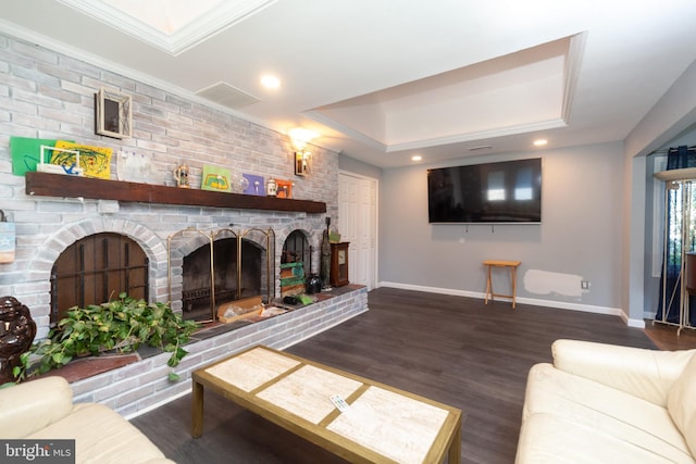 4504 Harbor Beach Blvd, Brigantine, NJ 08203 - living area with a tray ceiling, baseboards, wood finished floors, a brick fireplace, and crown molding