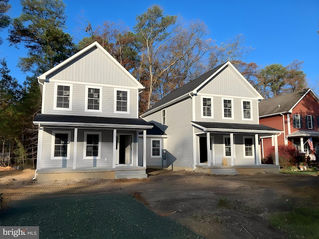 view of front property featuring covered porch