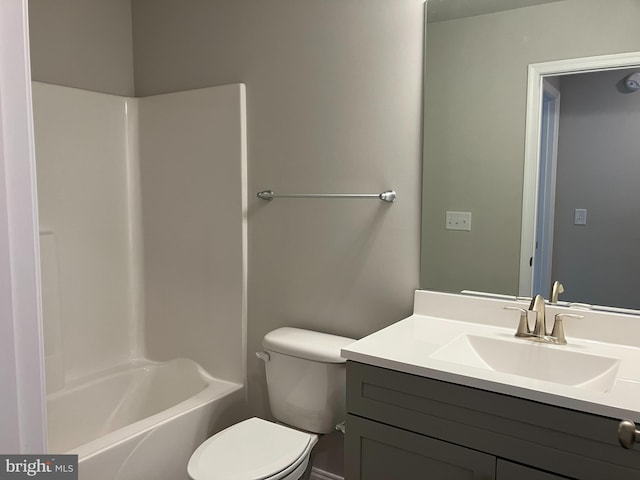 full bathroom with vanity, tub / shower combination, and toilet