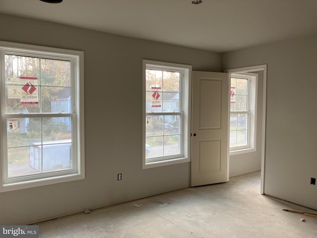 empty room featuring a wealth of natural light