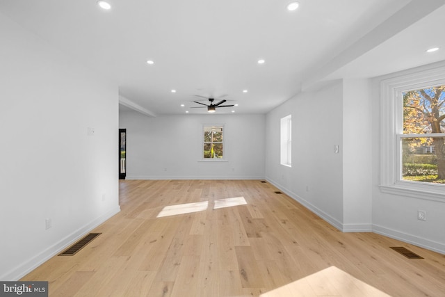 interior space with light hardwood / wood-style floors and ceiling fan