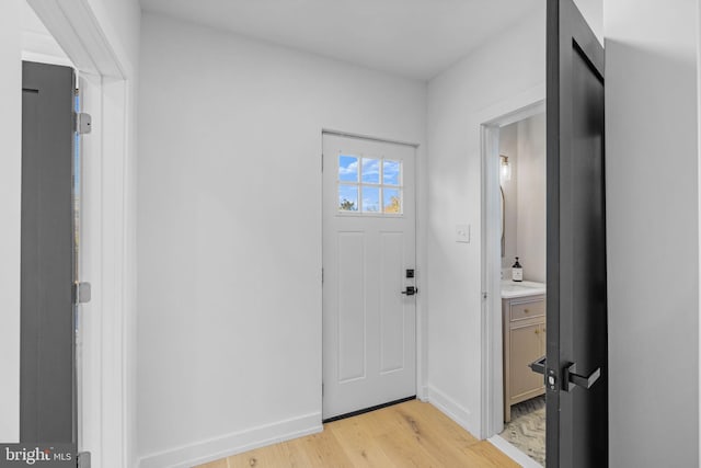 entrance foyer with light wood-type flooring