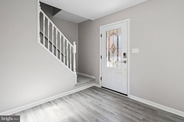 foyer featuring wood-type flooring